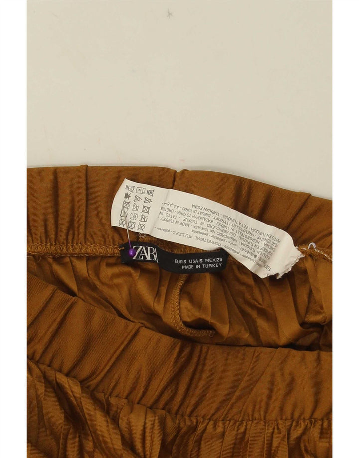 Calça feminina Zara com perna larga cortada pequena W26 L23 poliéster bege