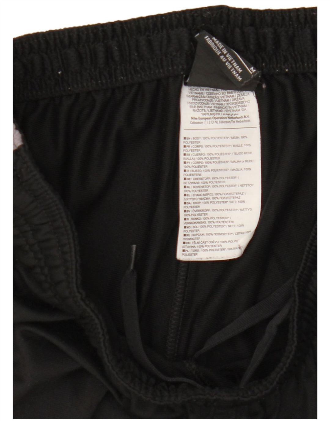 Calça de treino masculina Nike médio preto colorblock poliéster esportivo