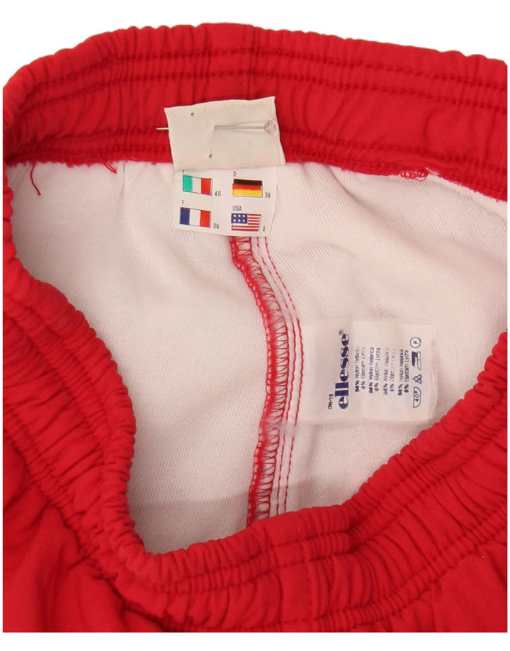 Ellesse Calça corta-vento feminina com estribo EUA 6 nylon vermelho médio