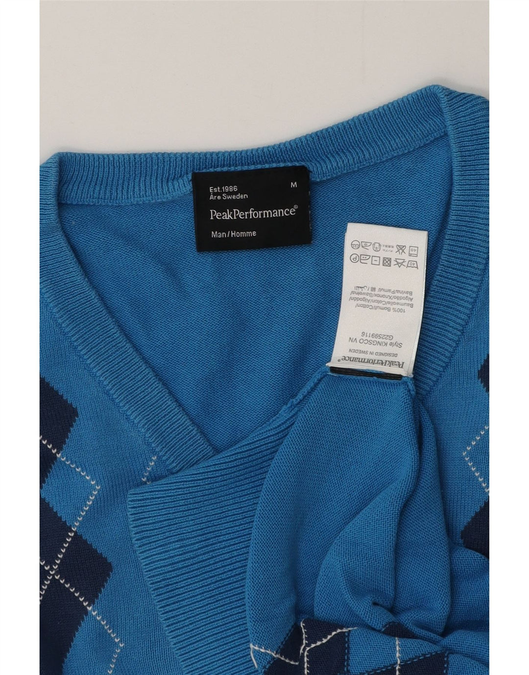 Suéter masculino Peak Performance com decote em V azul médio Argyle/Diamante