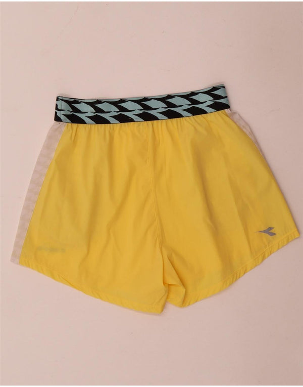 Shorts esportivos femininos Diadora UK 14 bloco colorido amarelo médio