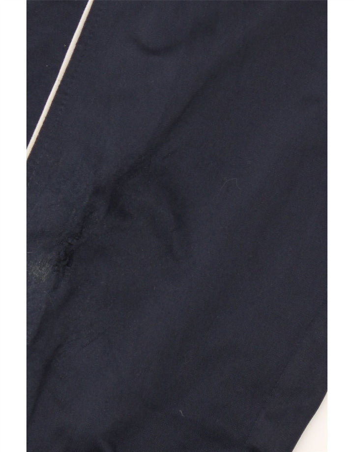 Calça de treino masculina Lotto com estampa gráfica média azul marinho colorblock