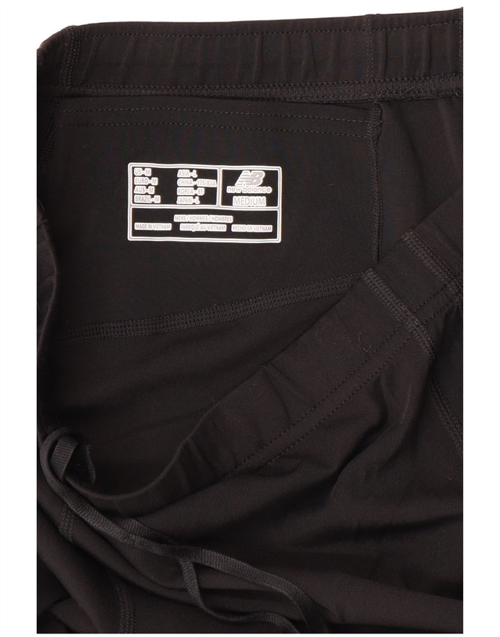 Calça de treino feminina New Balance UK 14 médio preto