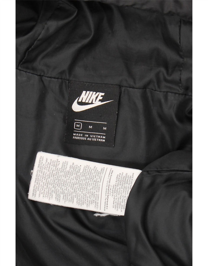 Jaqueta acolchoada com capuz gráfico Nike Boys 10-11 anos médio preto poliéster