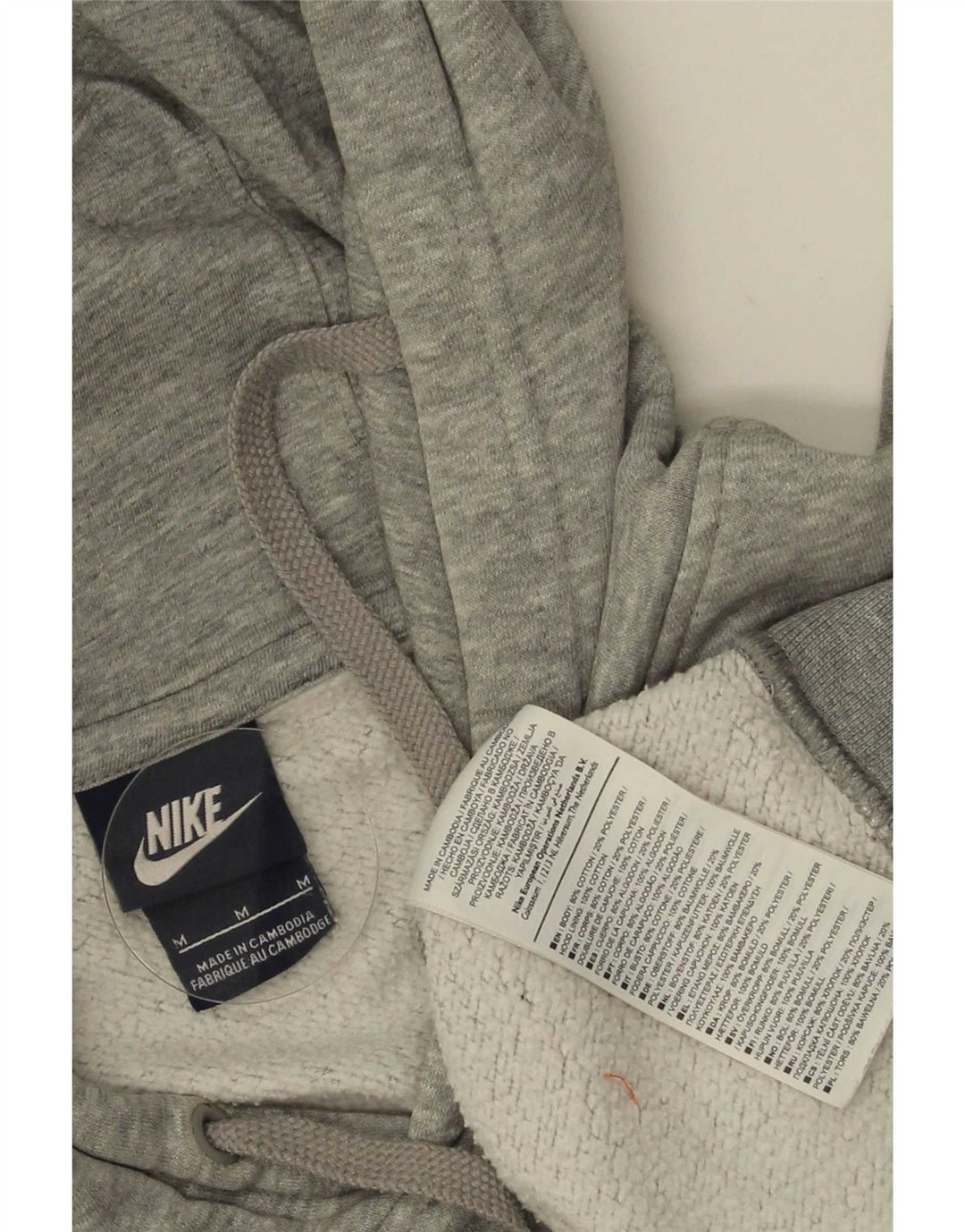 Suéter com capuz gráfico masculino Nike médio cinza algodão manchado
