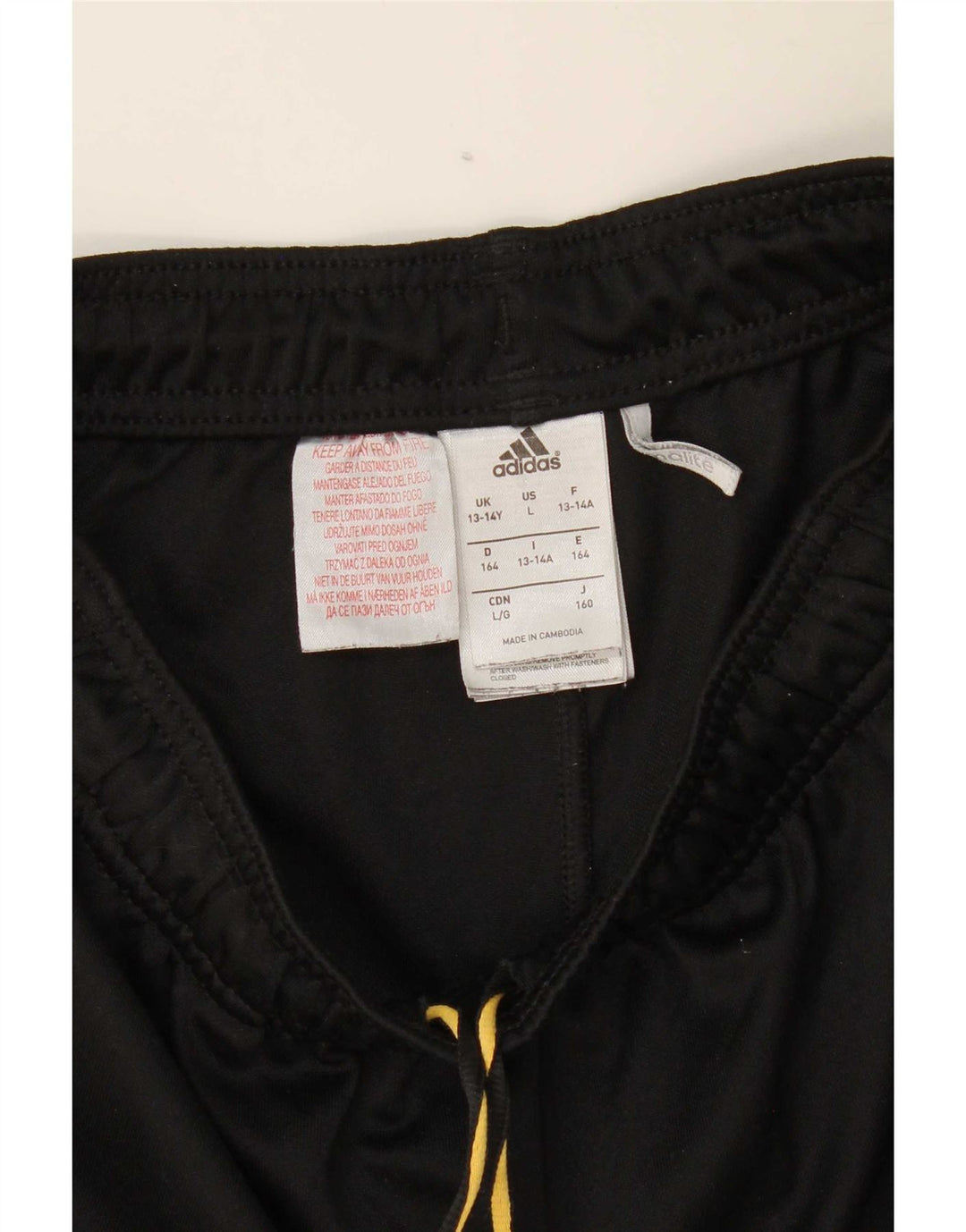 Calças de treino Adidas Boys Climalite 13-14 anos preto poliéster
