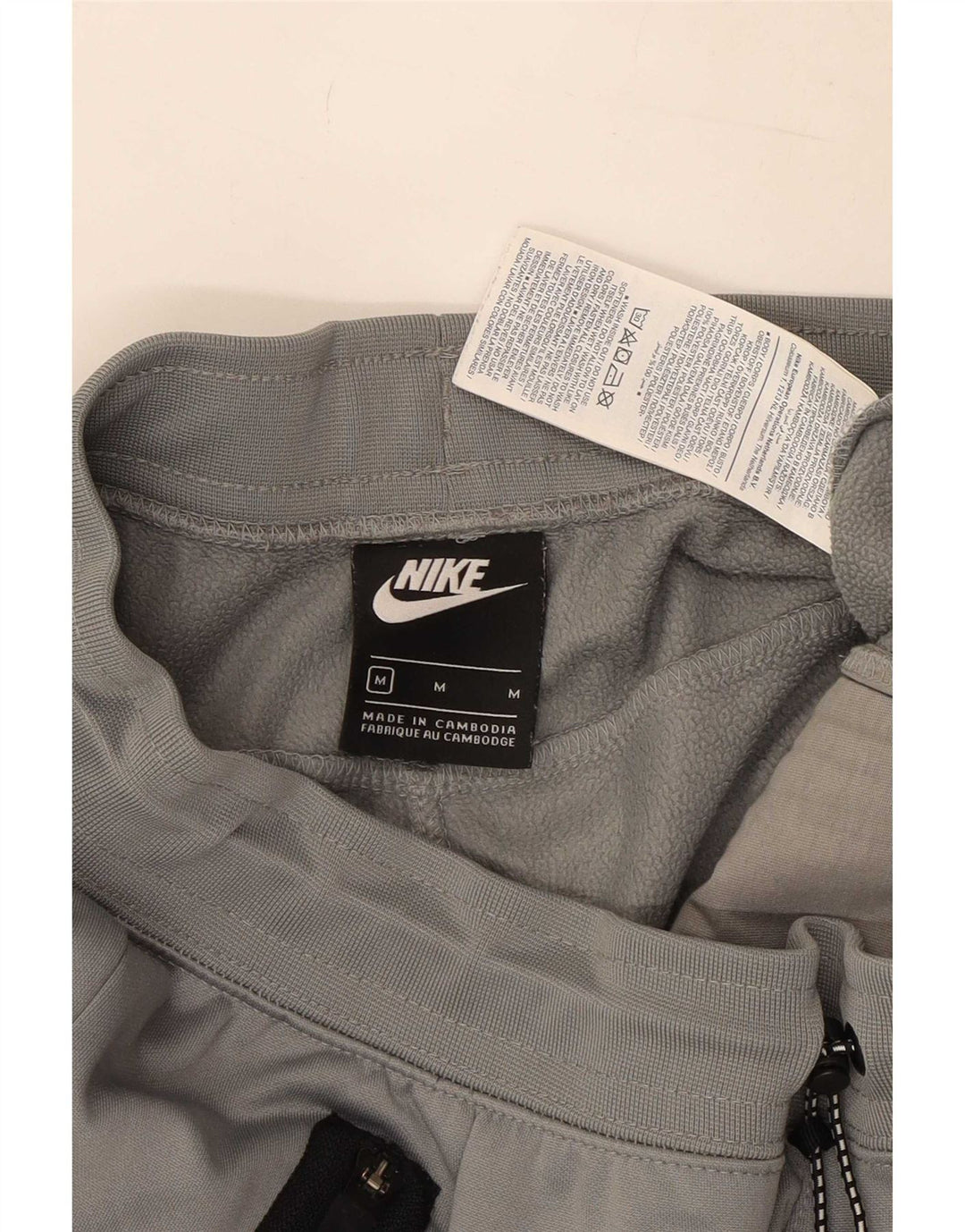 Calça de treino masculina Nike Joggers cinza médio colorblock poliéster