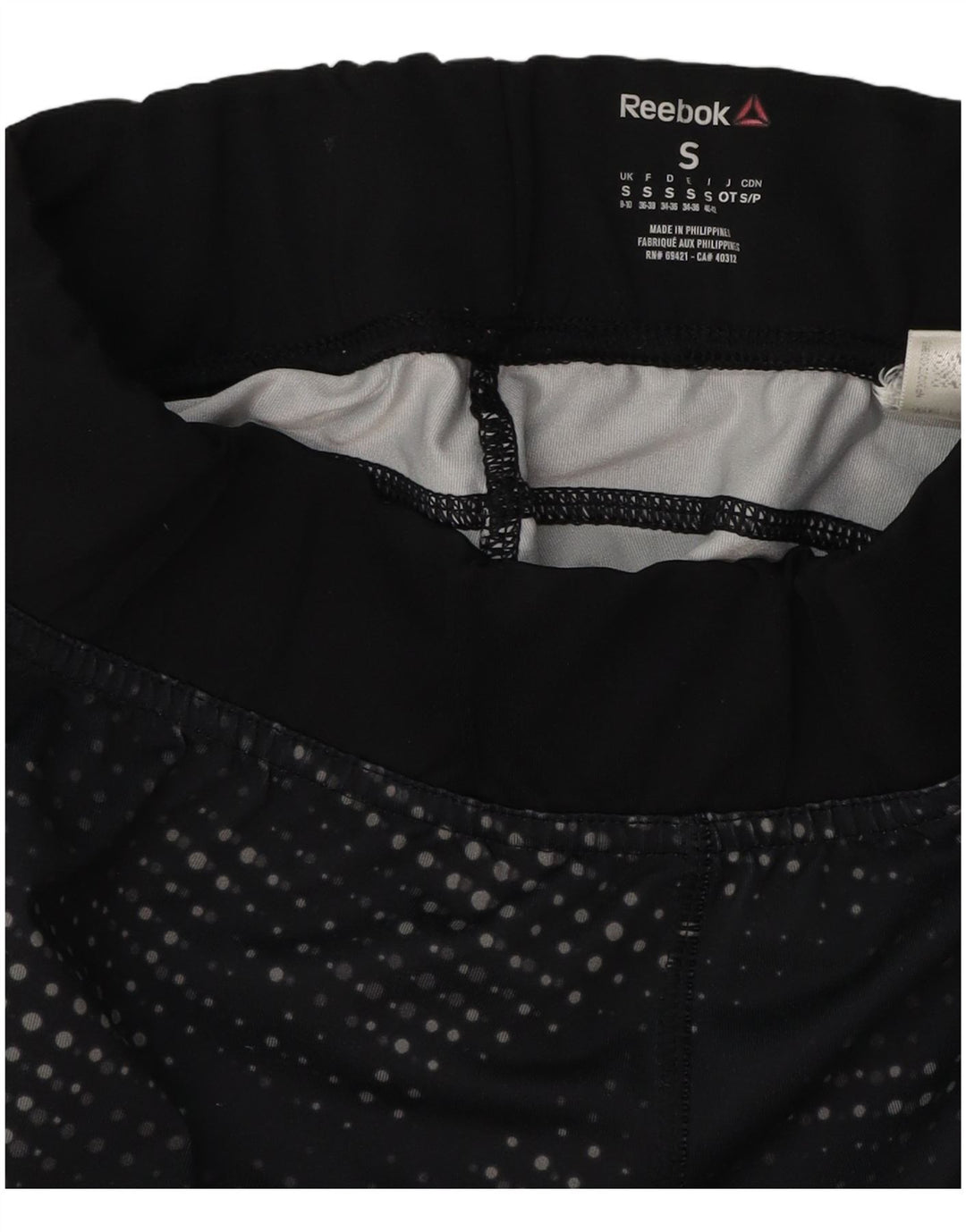 Leggings capri femininas REEBOK UK 8/10 pequenas pretas manchadas