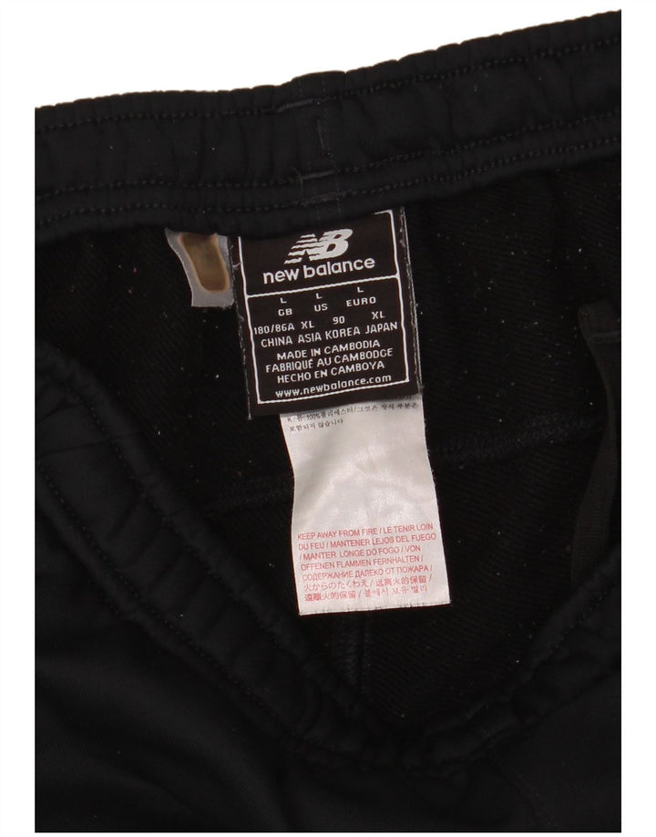 Calça de treino masculina New Balance grande poliéster preto