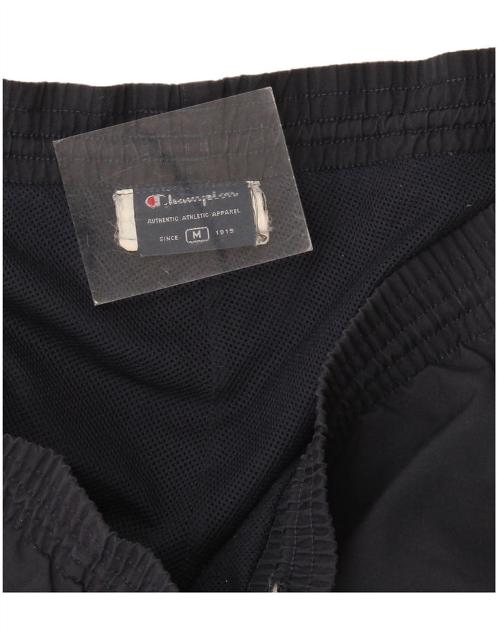 Calça de treino feminina Champion UK 14 poliéster azul marinho médio