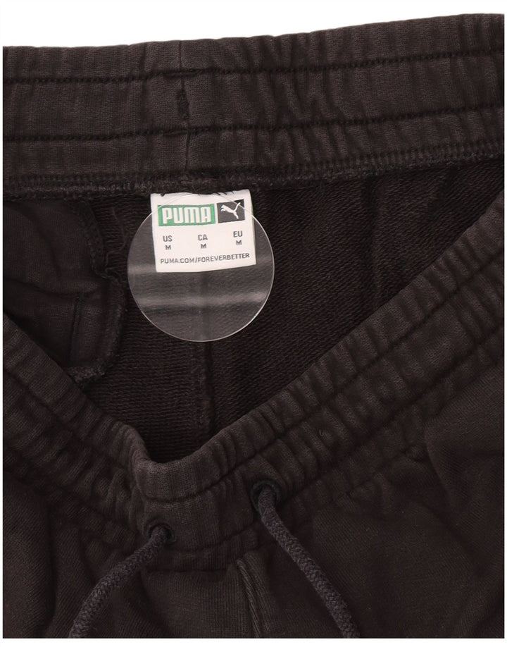 Calça de treino masculina Puma Graphic Joggers médio preto