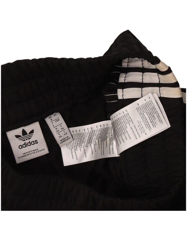 Shorts esportivos femininos Adidas UK 8 pequeno poliéster preto