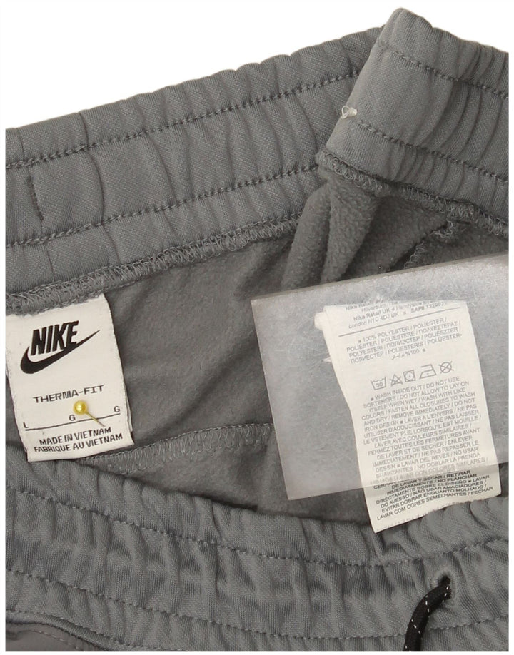 Calça esportiva masculina Nike Therma-Fit, calça jogger grande cinza poliéster